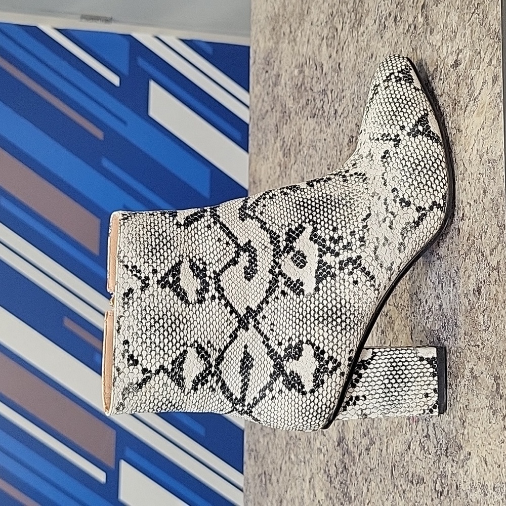 Snakeskin Wetkiss booties for women Size 10.5. Excellent condition
